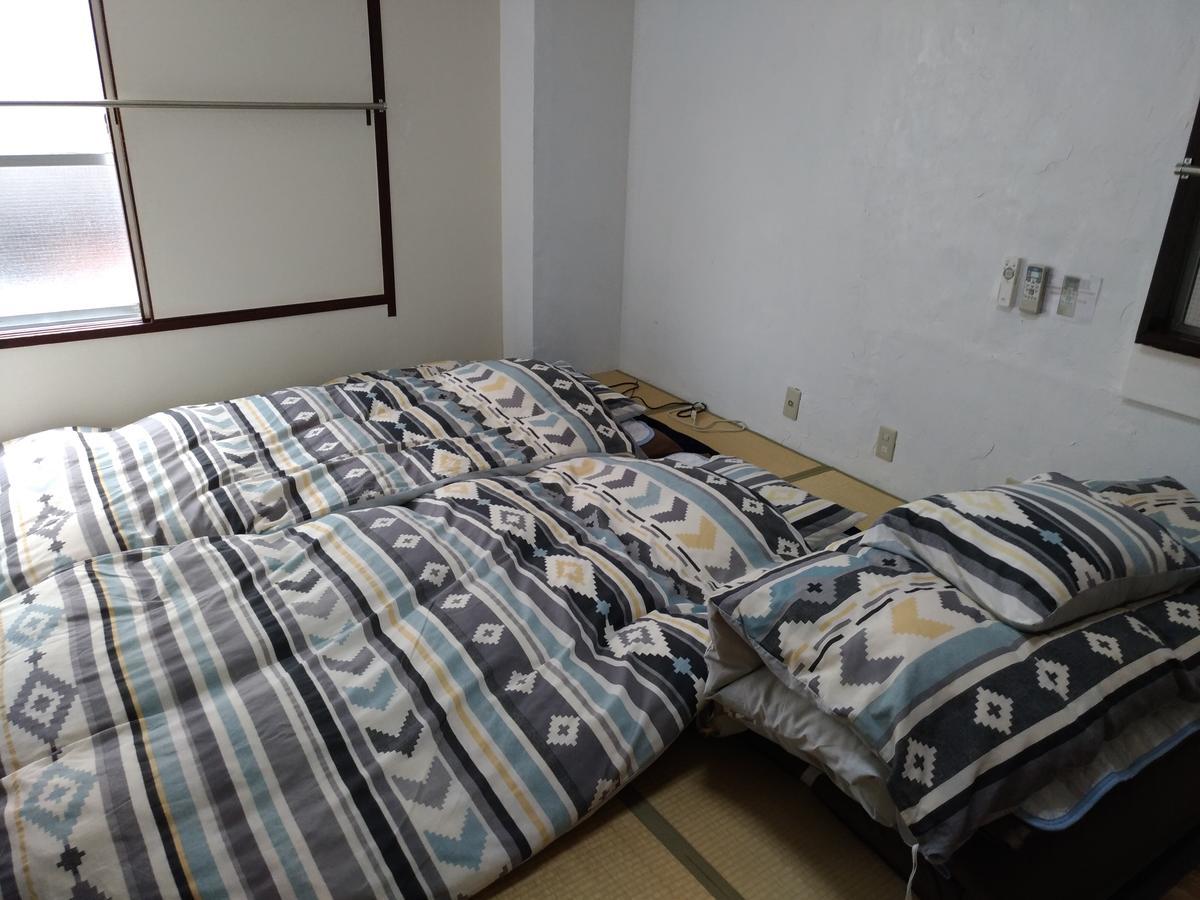 Boardinghouse Lejlighedshotel Osaka Eksteriør billede